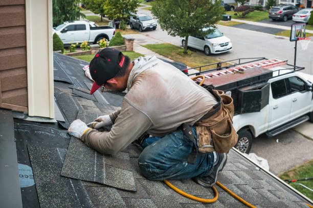 Professional Storm Damage Roof Repair technician working in Fulton, TX